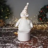 Игрушка мягкая &laquo;Снеговик в костюме со звёздами и в колпаке&raquo; 46&times;19 см, золотисто-белый