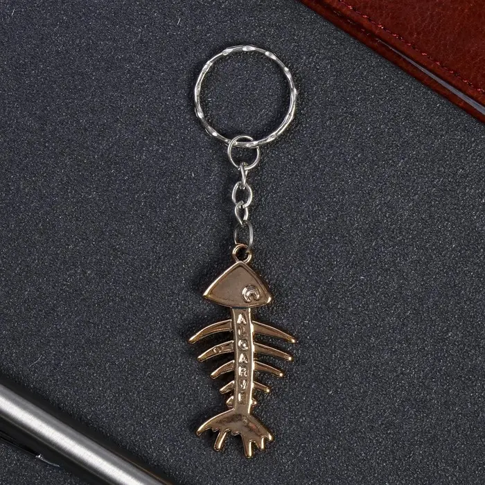 Брелок пластик под металл "Скелет рыбы" 2,5х5 см