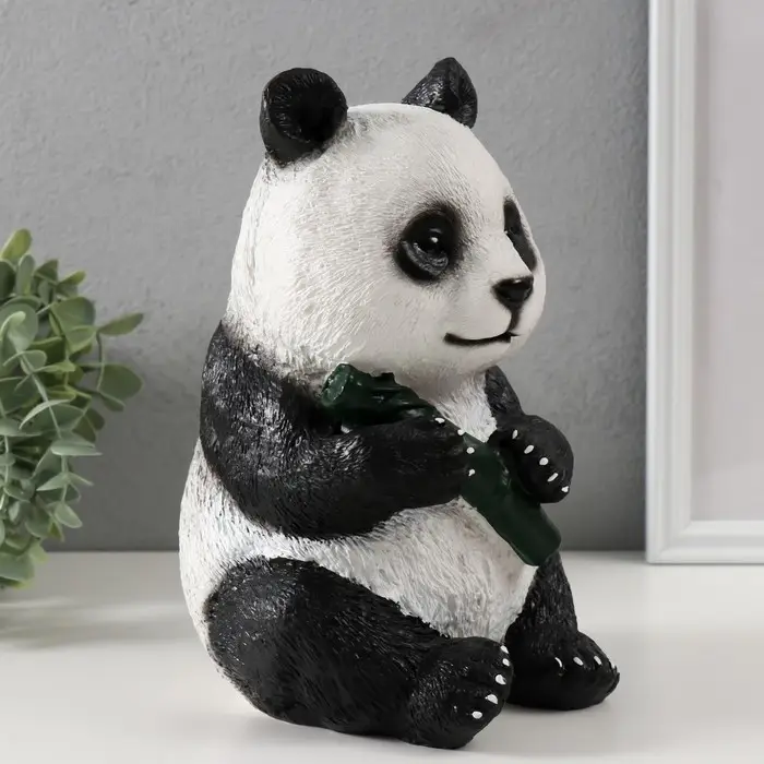 Копилка Копилка "Панда жующая " высота 23 см, ширина 16 см, длина 14,5 см.