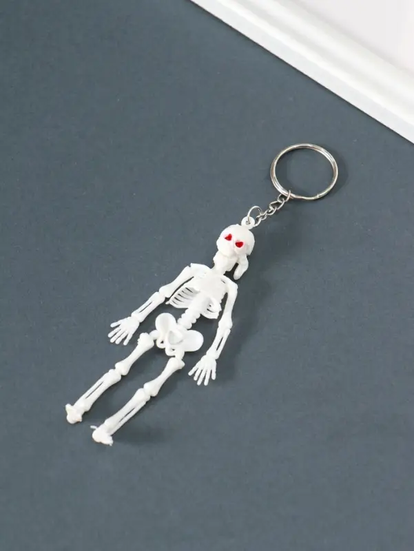 Брелок пластик "Скелет в бандане" белый 10х3,5х1 см