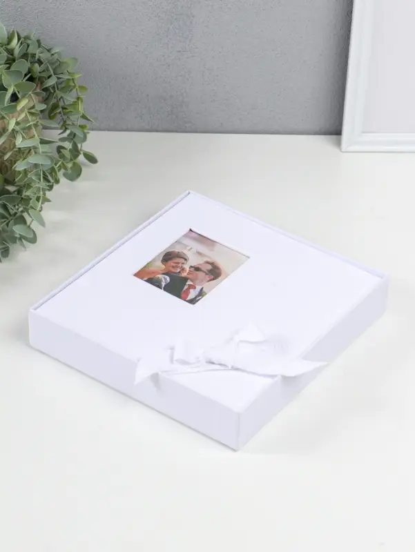 Фотоальбом на 100 фото 10х15 см "Белоснежный с бантом" в коробке 4х22х23 см