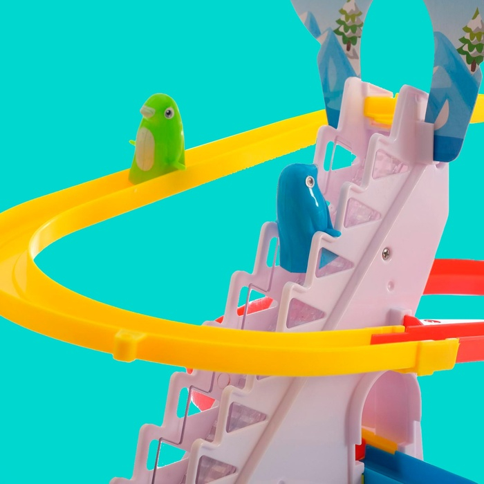 Развивающая игрушка «Пингвинчики на лесенке» Развивающая игрушка «Пингвинчики на лесенке»
