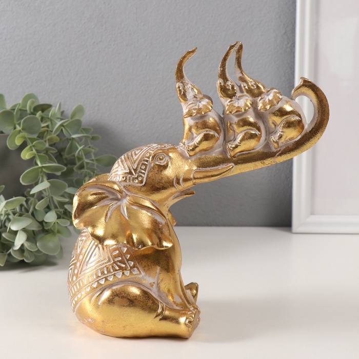 Сувенир полистоун Сувенир полистоун "Слон и 3 слонёнка на хоботе. Индейские узоры" золото 19,8х10,3х21,5 см