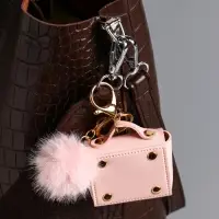 Брелок кожзам с карабином, с пушистиком "Сумочка" нежно-розовый 5,8х2,4х5 см Брелок кожзам с карабином, с пушистиком "Сумочка" нежно-розовый 5,8х2,4х5 см