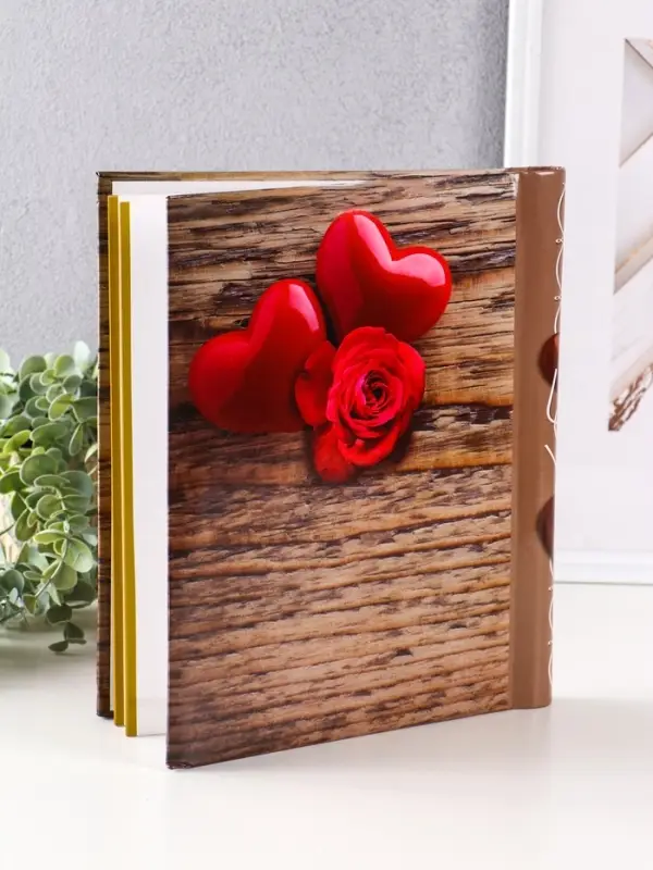 Фотоальбом 10 магнитных листов Фотоальбом 10 магнитных листов " Сердца" 23X28см, пер-т внутр.спираль