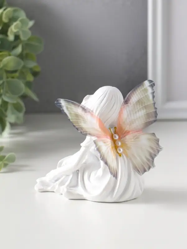 Сувенир полистоун "Девочка-бабочка" белый 6,5х10х9,7 см