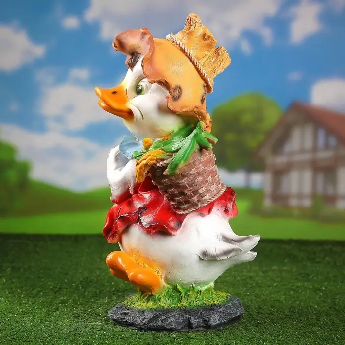 Садовая фигура из полистоуна «Утёнок с кукурузой», 48×22×26 см