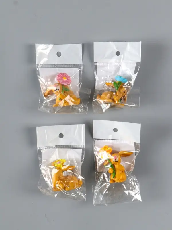 Сувенир полистоун  Сувенир полистоун "Заяц с яркой ромашкой" МИКС 2,5х3,8х4,4 см