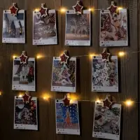 Гирлянда &laquo;Нить&raquo; 2 м, роса с насадками &laquo;Прищепки-звёздочки&raquo;, IP20, серебристая нить, 20 LED, от батареек АА&times;2, свечение тёплое белое