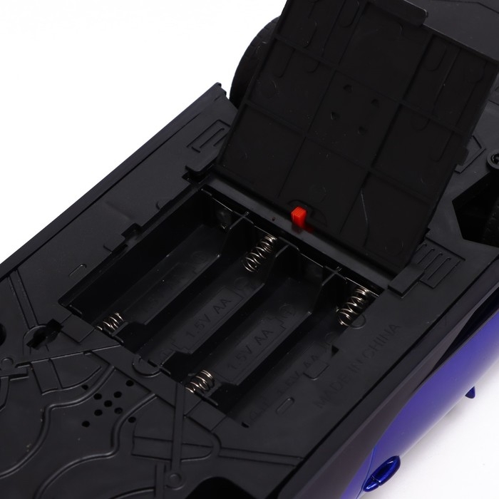 Машина радиоуправляемая «Купе», в комплекте педали и руль, работает от батареек, цвет синий Машина радиоуправляемая «Купе», в комплекте педали и руль, работает от батареек, цвет синий