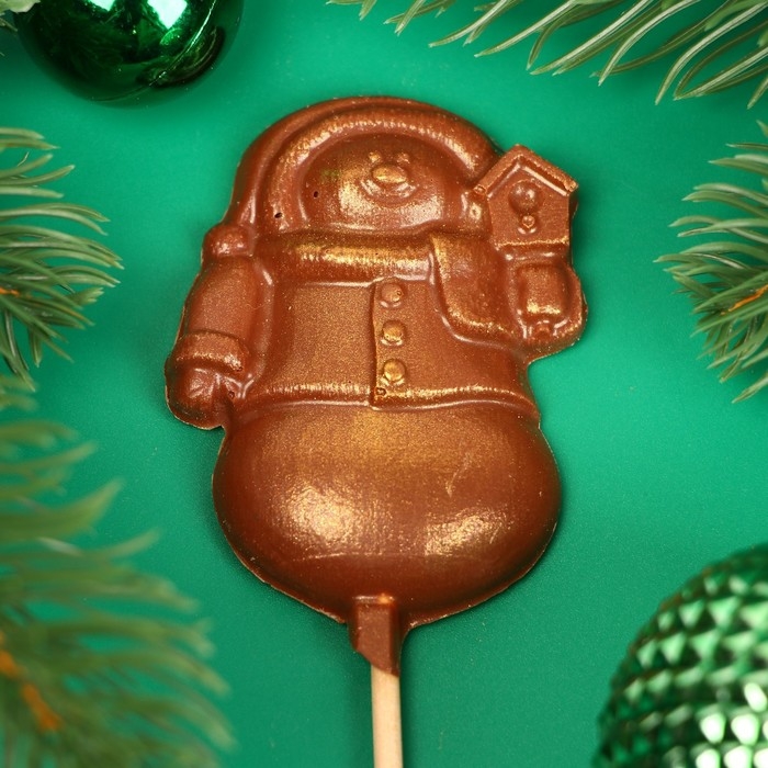 Новый год. Фигура из молочного шоколада Новый год. Фигура из молочного шоколада "Снежная баба", на палочке , 20 г ± 5 %