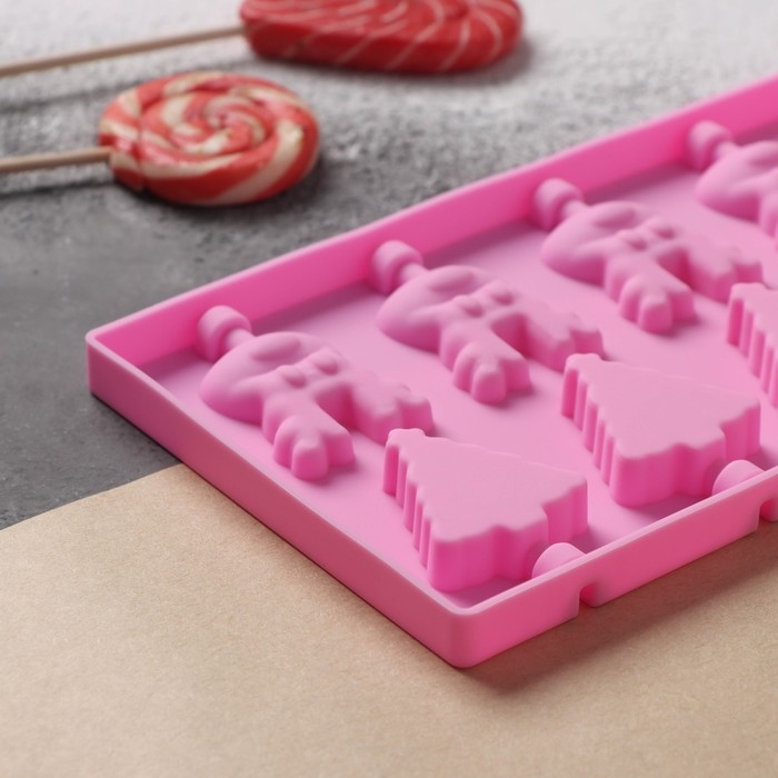 Форма для леденцов новогодняя Доляна «Новый год», силикон, 25×10,5×1 см, 12 ячеек, с палочками, цвет розовый Форма для леденцов новогодняя Доляна «Новый год», силикон, 25×10,5×1 см, 12 ячеек, с палочками, цвет розовый