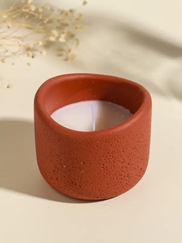 Свеча в вулканическом подсвечнике "Изгиб" персиковая 8,3х8,5х7 см