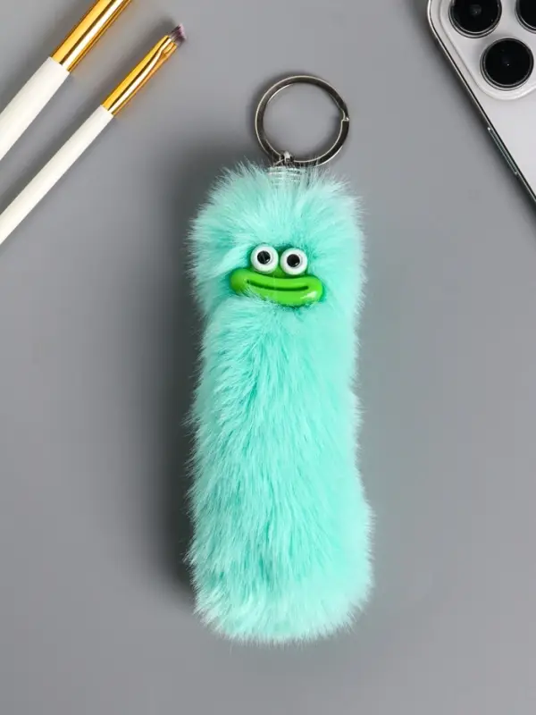 Пушистик на кольце "Чудик" мятный 19х4х4 см