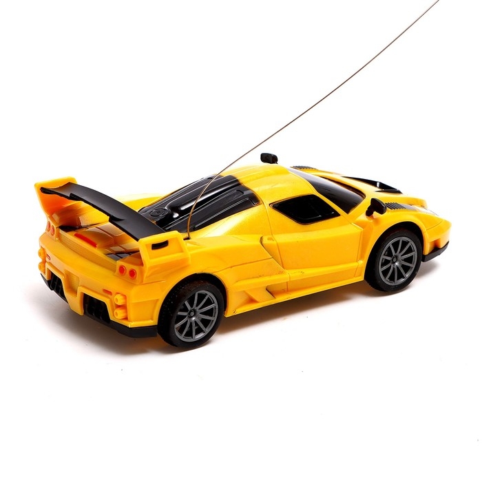Машина радиоуправляемая «СпортКар», работает от батареек, цвет жёлтый Машина радиоуправляемая «СпортКар», работает от батареек, цвет жёлтый