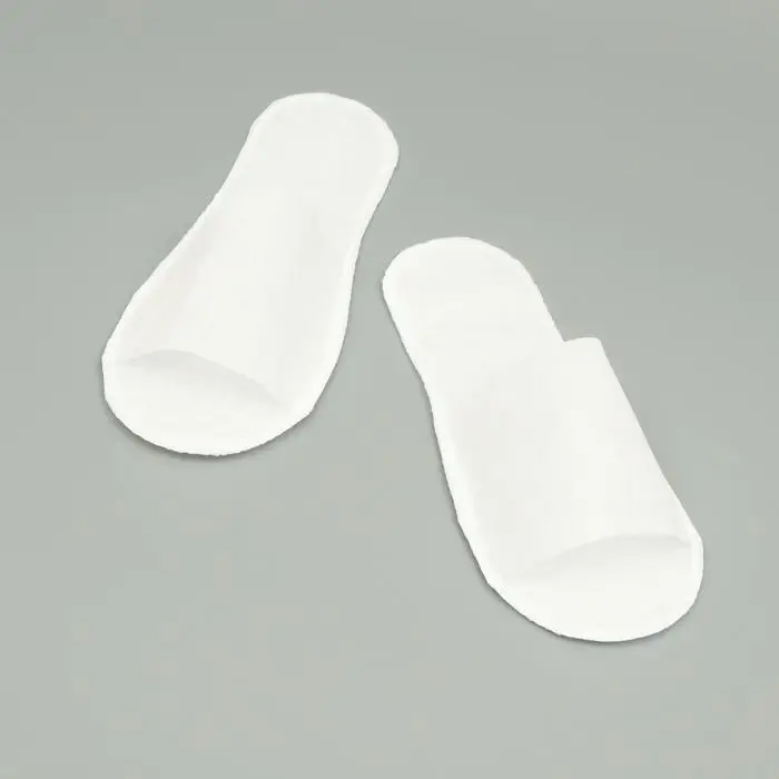 Одноразовые тапочки, эконом, белые, 42 р. Одноразовые тапочки, эконом, белые, 42 р.