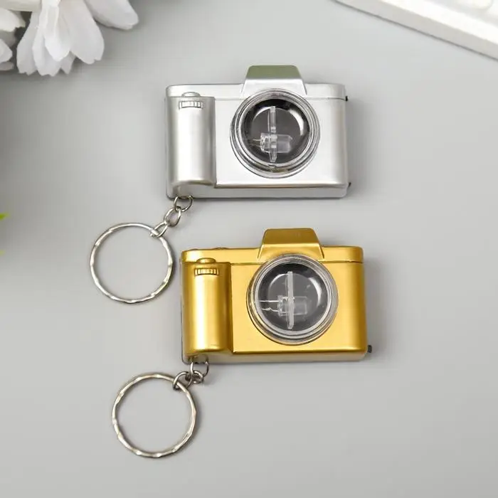 Фонарик брелок для ключей на кольце «Фотоаппарат», мигает, золото/серебро, 3.3×4.8×2 см, МИКС Фонарик брелок для ключей на кольце «Фотоаппарат», мигает, золото/серебро, 3.3×4.8×2 см, МИКС