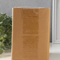 Сувенир керамика "Зайчик в зелёном костюме, лежит на яйце" 10,4х10х14,9 см