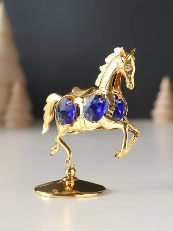 Сувенир Лошадка маленькая с 4-мя синими хрусталиками на подставке, 6,5х4х8,5 см. Сувенир Лошадка маленькая с 4-мя синими хрусталиками на подставке, 6,5х4х8,5 см.
