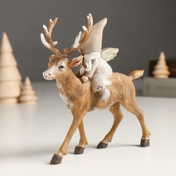 Сувенир полистоун  Сувенир полистоун "Малышка-ангел в сером наряде, верхом на олене" 5,5х14х14,5 см