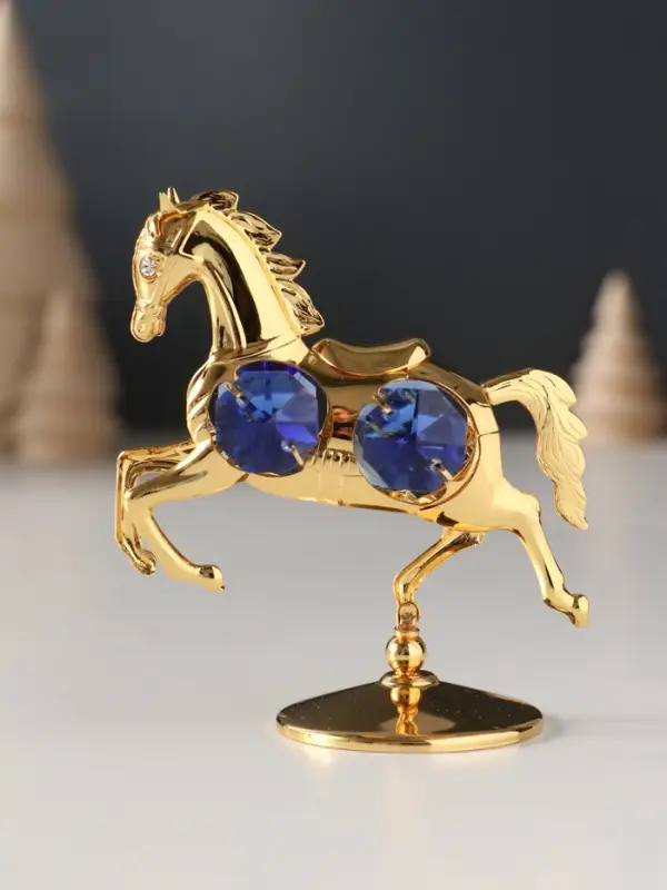 Сувенир Лошадка маленькая с 4-мя синими хрусталиками на подставке, 6,5х4х8,5 см. Сувенир Лошадка маленькая с 4-мя синими хрусталиками на подставке, 6,5х4х8,5 см.