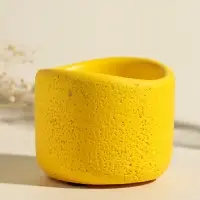 Свеча в подсвечнике вулканическом &laquo;Изгиб&raquo;, жёлтая, 8.3&times;8.5&times;7 см