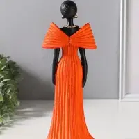 Сувенир полистоун "Девушка в ярко-оранжевом платье с большим бантом" чёрный 11х9,5х30,5 см   1092991