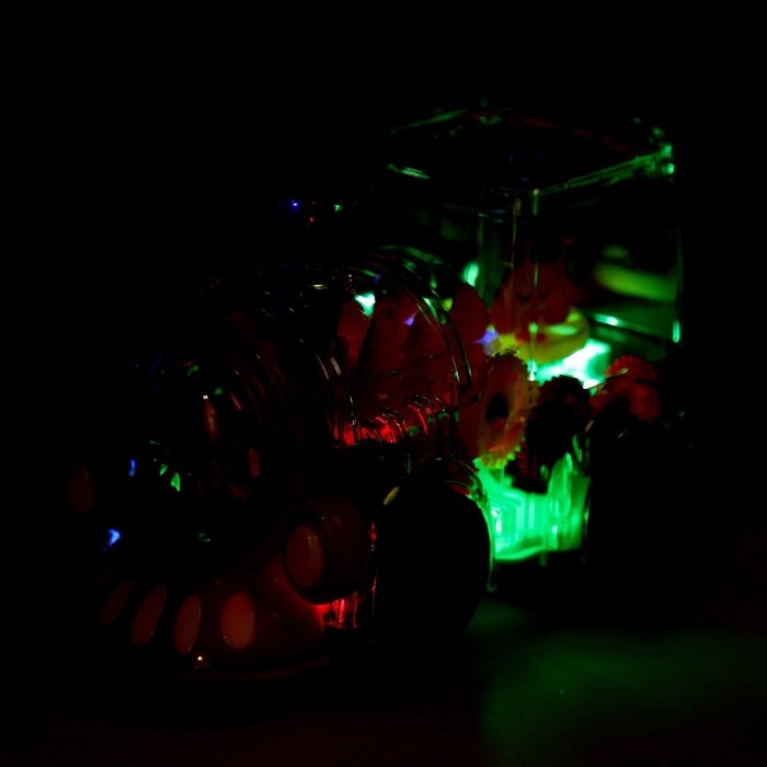 Паровоз «Новогодний поезд», световые и звуковые эффекты, работает от батареек Паровоз «Новогодний поезд», световые и звуковые эффекты, работает от батареек