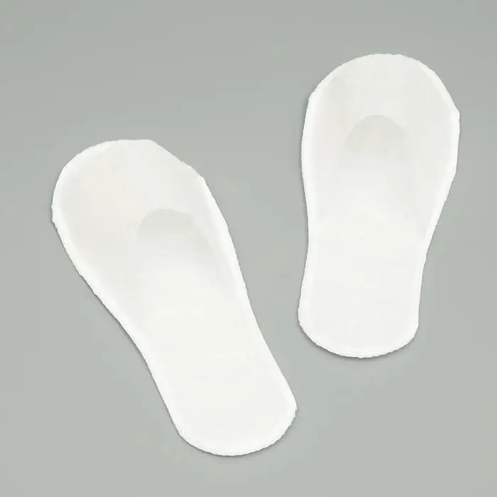 Одноразовые тапочки, эконом, белые, 42 р. Одноразовые тапочки, эконом, белые, 42 р.