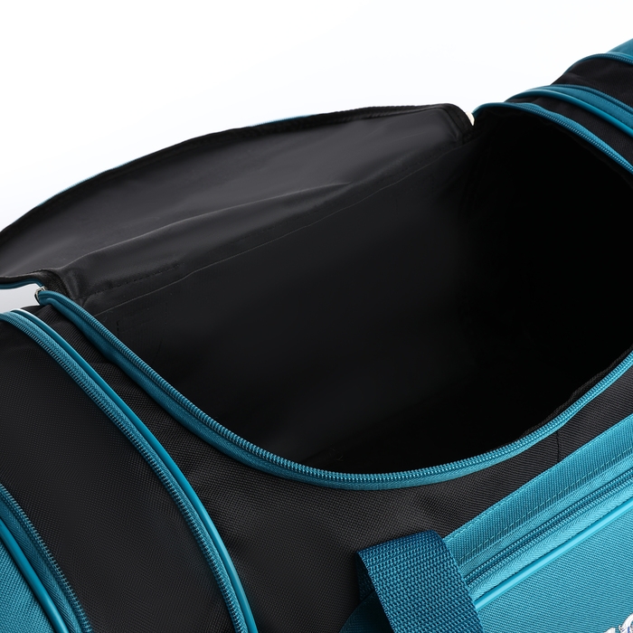 Сумка дорожная на молнии, с увеличением, 2 наружных кармана, длинный ремень, цвет чёрный/морской волны Сумка дорожная на молнии, с увеличением, 2 наружных кармана, длинный ремень, цвет чёрный/морской волны