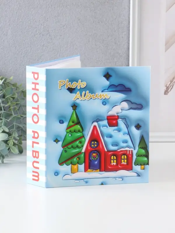 Фотоальбом на 40 фото 13х18 см Фотоальбом на 40 фото 13х18 см "Новогодний домик" в коробке тисн.серебро 5х18х20,8 см