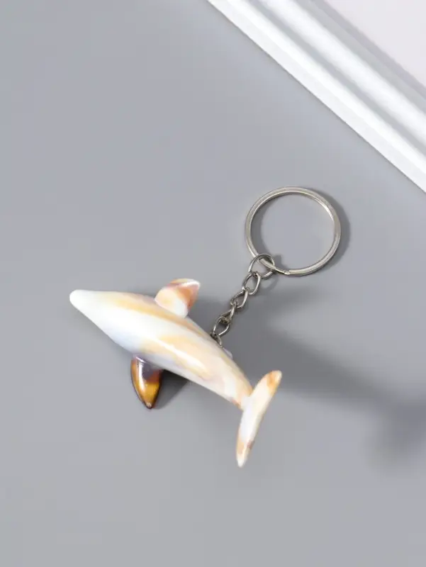 Брелок пластик "Дельфин" под песочный мрамор 7,4х2,8х2 см
