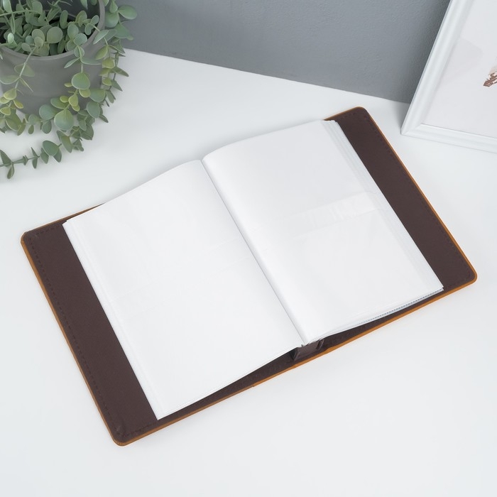 Фотоальбом на 200 фото 10х15 см Фотоальбом на 200 фото 10х15 см "Дерево Орех" кожзам 4х20,3х26,2 см