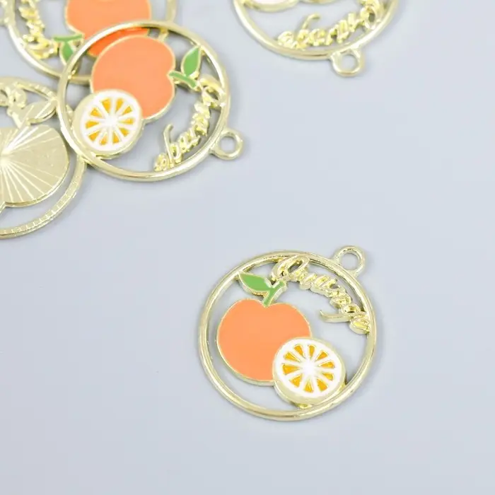 Декор для творчества металл, эмаль "Апельсин и половина апельсина в круге" золото 2,1х2,5 см   93714