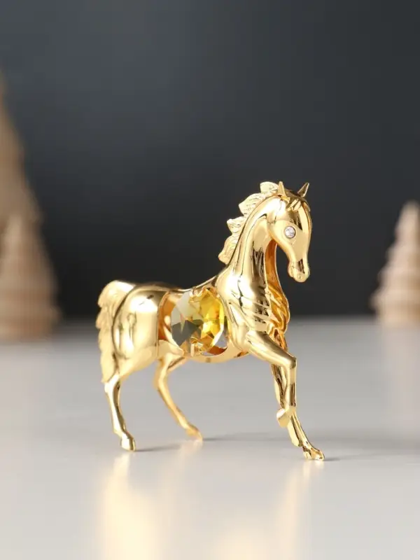Сувенир Лошадка маленькая с 2-мя желтыми хрусталиками, 7х2х6 см. Сувенир Лошадка маленькая с 2-мя желтыми хрусталиками, 7х2х6 см.