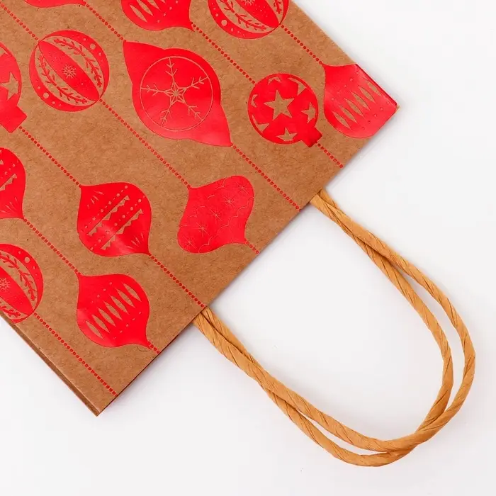 Пакет крафт с тиснением, круглая ручка, «Ёлочные игрушки» 15×21×8 см Пакет крафт с тиснением, круглая ручка, «Ёлочные игрушки» 15×21×8 см