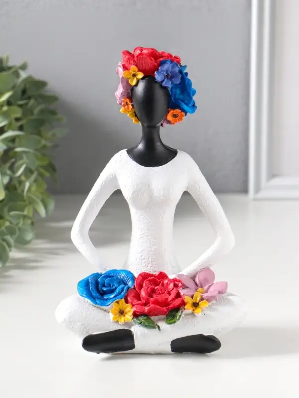 Сувенир полистоун "Девушка-йогиня в позе лотоса, с цветами" чёрный 12,5х9,5х19,5 см