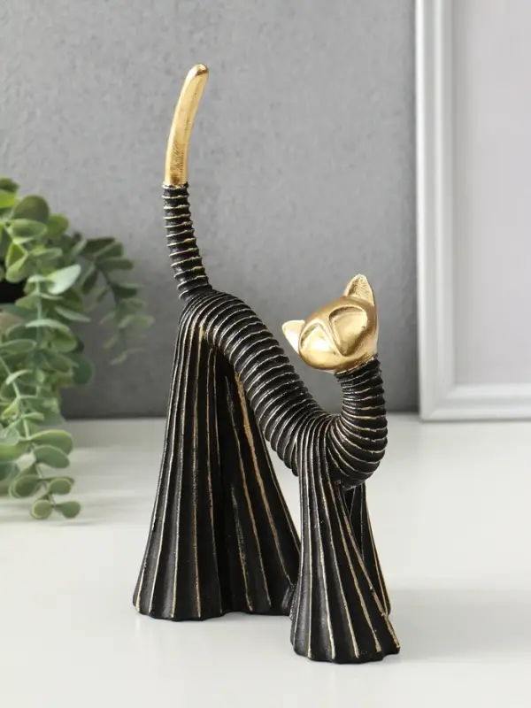 Сувенир полистоун Сувенир полистоун "Кошка в клёшах" чёрно-золотая 7,5х15х25 см