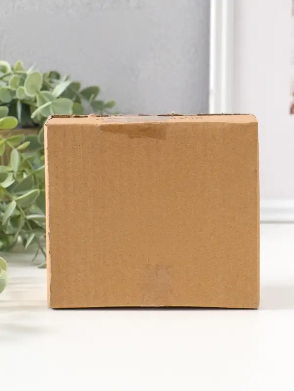 Сувенир полистоун "Зайчик с жёлтым цветочным сердцем" 11,5 см