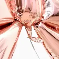 Воздушный шар фольгированный 50" "Бант" цвет розовое-золото