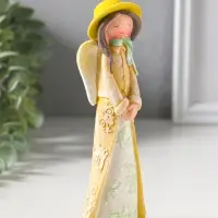 Сувенир полистоун "Малышка-ангел в желтой накидке и шляпке" 6х4,2х17 см