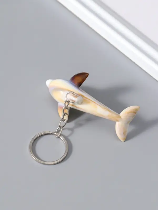 Брелок пластик "Дельфин" под песочный мрамор 7,4х2,8х2 см