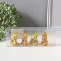 Сувенир полистоун "Слон на монетах и слитках" набор 4 шт золото 2,5х5х5 см