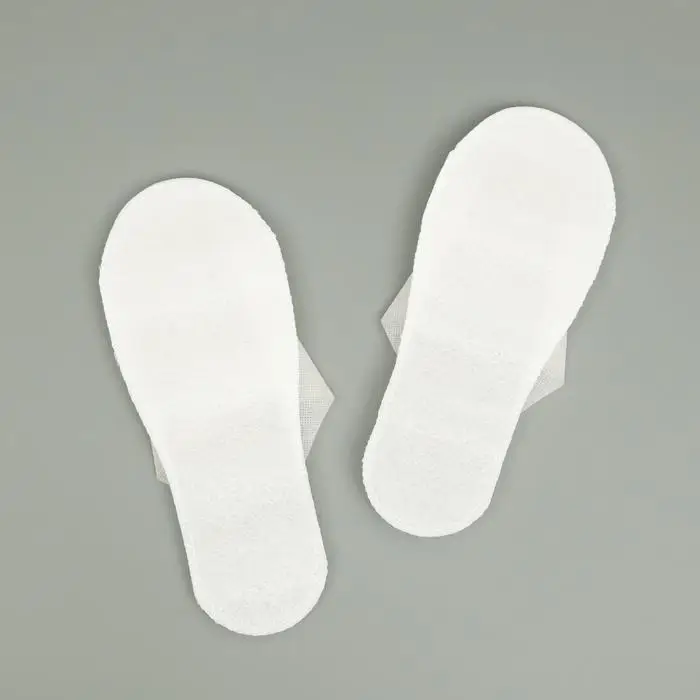Тапочки одноразовые Эконом белые, закрытый мыс Тапочки одноразовые Эконом белые, закрытый мыс