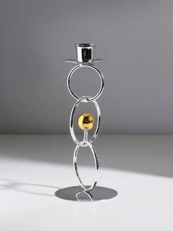 Подсвечник металл на 1 свечу  Подсвечник металл на 1 свечу "Кольца и шарики" серебро с золотом d=2,5 см 9х9х22 см