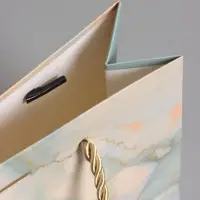 Пакет подарочный "Мрамор" , голубой , с бантиком , 19 х 15 х 7 см