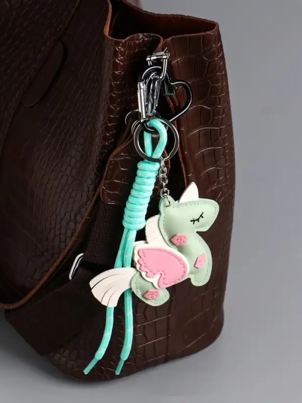 Брелок на карабине кожзам, текстиль  Брелок на карабине кожзам, текстиль "Единорог с крыльями" зелёный, с узлом 24х10,5х1,5 см