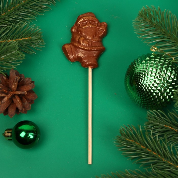 Новый год. Фигура из молочного шоколада Новый год. Фигура из молочного шоколада "Дед мороз", на палочке , 20 г ± 5 %