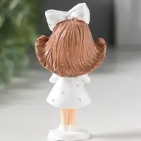 Сувенир полистоун "Девочка с большим бантом в волосах, держит сердце" 4,7х3х9 см