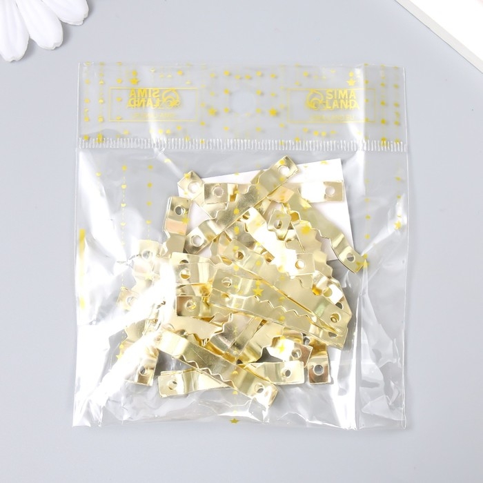 Зубчатая подвеска для картин, фоторамок металл (набор 40 шт) золото 4х0,5 см Зубчатая подвеска для картин, фоторамок металл (набор 40 шт) золото 4х0,5 см